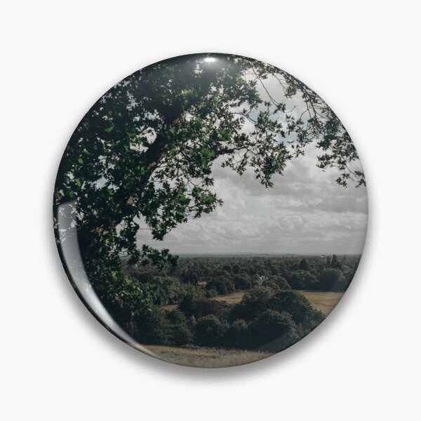Item preview, High View Of Grassy Hill And Forest Landscape Under Tree Frame    designed and sold by Reillyont.