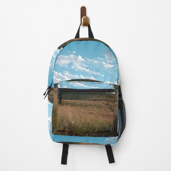 Item preview, Low Angle View Of Grassy Hill Under Blue Sky With Clouds designed and sold by Reillyont.