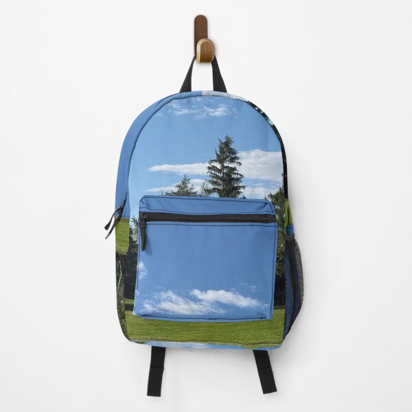Item preview, Pine Trees Standing On Green Lawn Under Blue Sky designed and sold by Squikale.