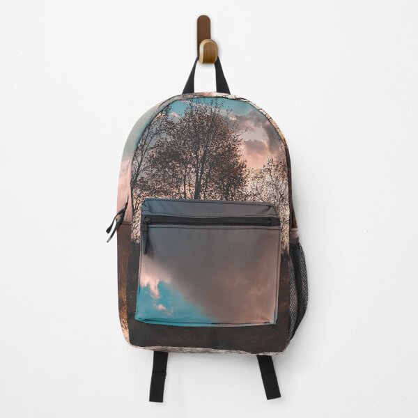 Item preview, Silhouetted Trees At Sunset With Dramatic Clouds designed and sold by Squikale.
