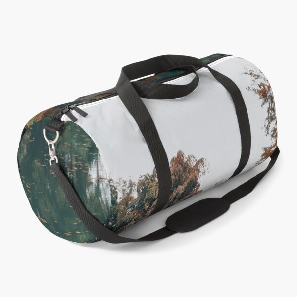 Item preview, Reflective Forest Lake Surrounding By Autumn Trees designed and sold by Squikale.