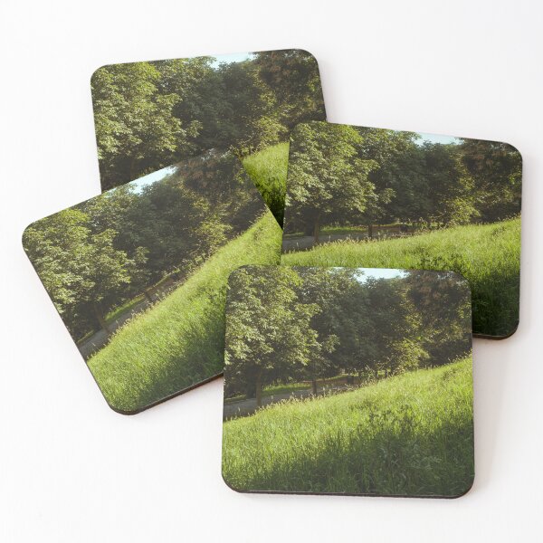Item preview, Sunlit Grassy Slope Beside Tree-Lined Pathway designed and sold by Squikale.