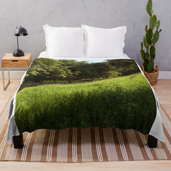 Item preview, Sunlit Grassy Slope Beside Tree-Lined Pathway designed and sold by Squikale.
