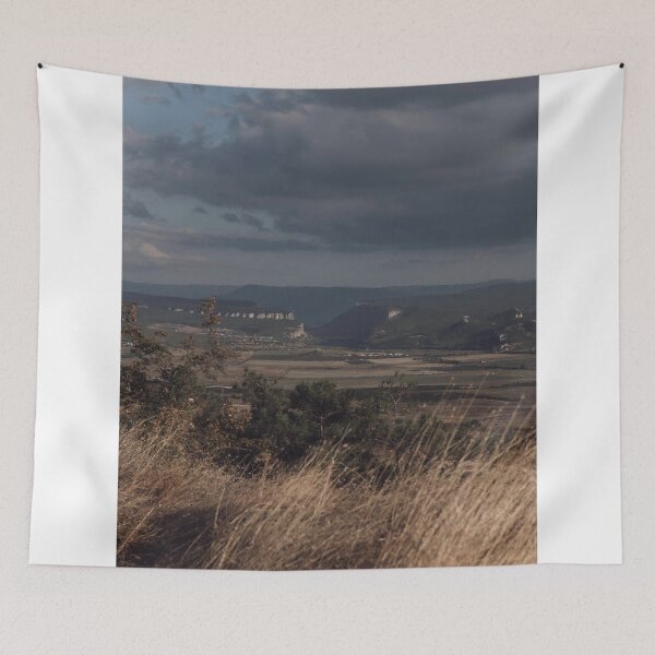 Item preview, Panoramic View Of Distant Valleys Under Overcast Sky designed and sold by Squikale.