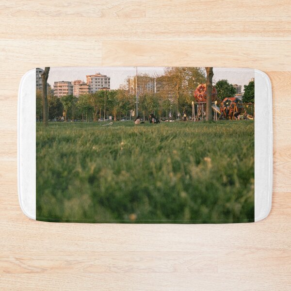 Item preview, Low-Angle View Of City Park Lawn At Sunset designed and sold by Squikale.