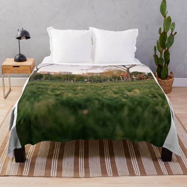 Item preview, Low-Angle View Of City Park Lawn At Sunset designed and sold by Squikale.