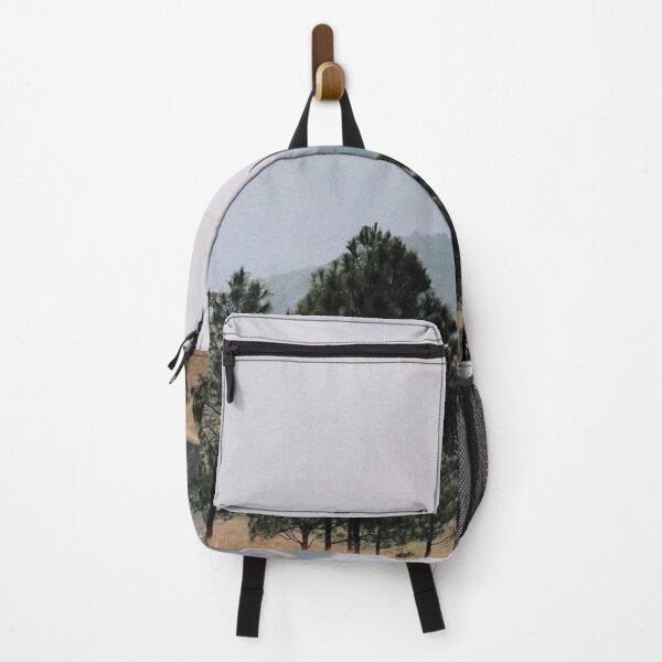 Item preview, Person Standing Among Pine Trees On Dry Grassland designed and sold by Ayubaslatere.