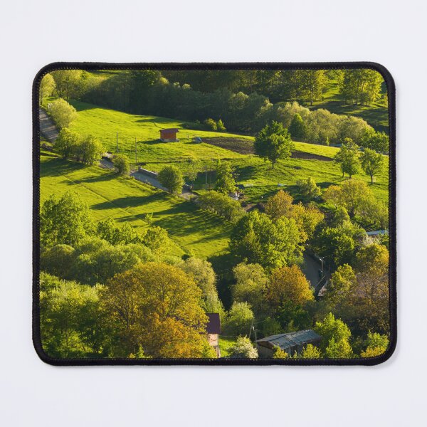 Item preview, Aerial View Of Sunlit Countryside Village And Road designed and sold by Ayubaslatere.