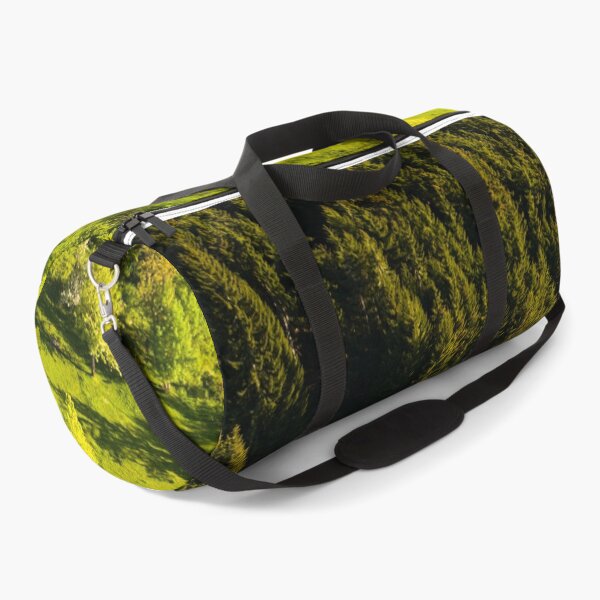 Item preview, Sunlit Green Hillside Bordered By Dense Forest designed and sold by Ayubaslatere.