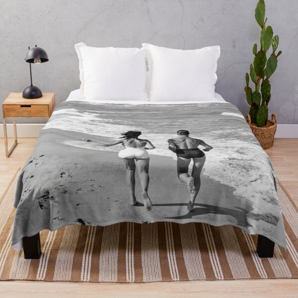 Item preview, Couple wearing jogging at edge of ocean beach designed and sold by ImogenPowell44.