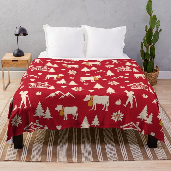 Aperçu de l'œuvre Modèle de découpage de vache suisse | Vaches alpines avec cloches, chalets et edelweiss sur fond rouge créée et vendue par StickyGuys.