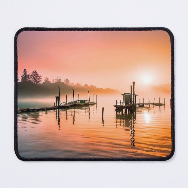Item preview, Tranquil sunrise over a wooden pier and hut on calm water designed and sold by homydesign.