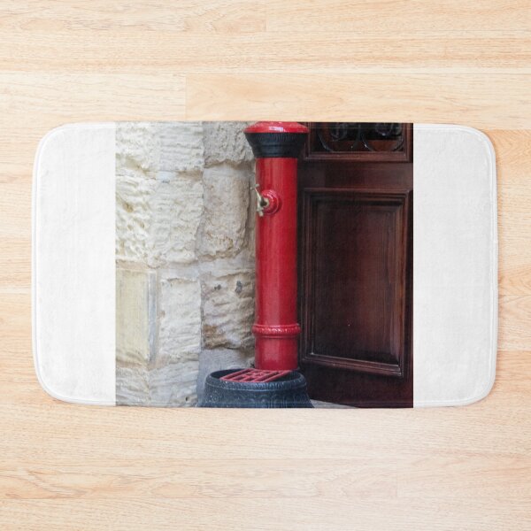 Item preview, Red Vintage Water Pump Next to Stone Wall and Wooden Door in Mediterranean Alley designed and sold by Nmallia.