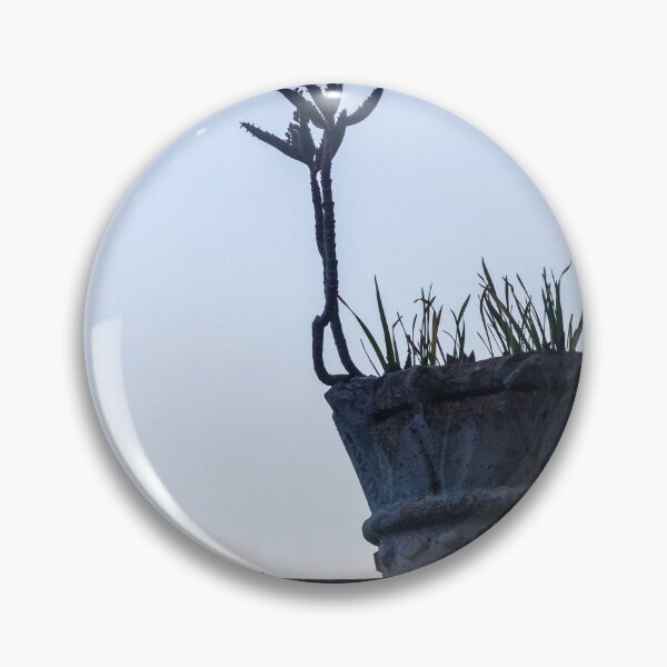 Item preview, Silhouetted Potted Cactus On A Weathered Pot At Dusk On Rooftop Wall designed and sold by Nmallia.
