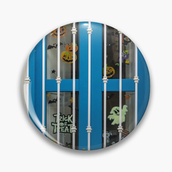 Item preview, Blue Window With White Iron Bars and Halloween Decorations Saying Trick Or Treat designed and sold by Nmallia.