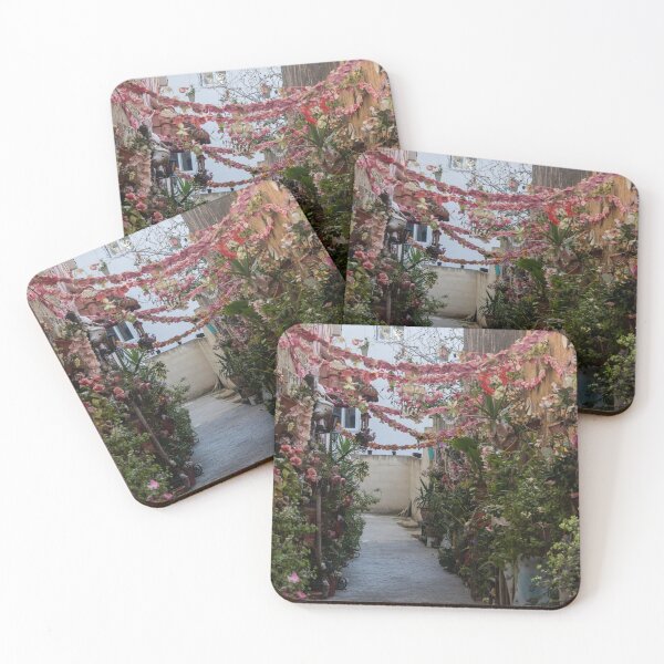 Item preview, Flower-Decked Narrow Alleyway With Hanging Pink Garlands And Lush Potted Plants designed and sold by Nmallia.