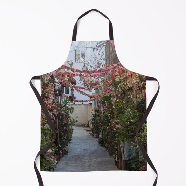 Item preview, Flower-Decked Narrow Alleyway With Hanging Pink Garlands And Lush Potted Plants designed and sold by Nmallia.