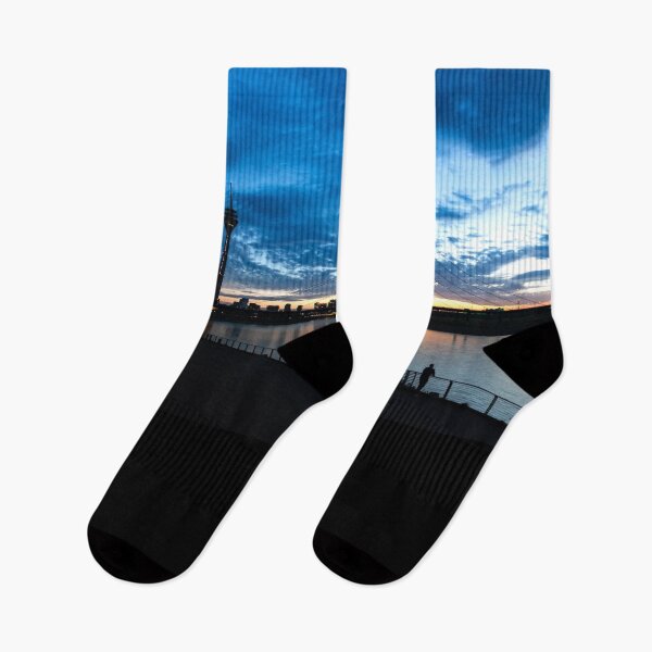 Item preview, Düsseldorf skyline at sunset with sun reflection and clouds. designed and sold by Your Happy Life.