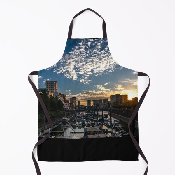 Item preview, Düsseldorf Media Harbour at sunset with sun reflection and small clouds designed and sold by Your Happy Life.