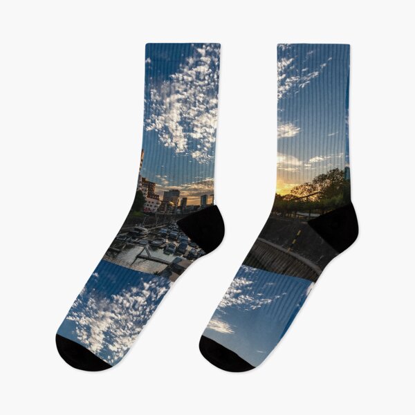 Item preview, Düsseldorf Media Harbour at sunset with sun reflection and small clouds designed and sold by Your Happy Life.