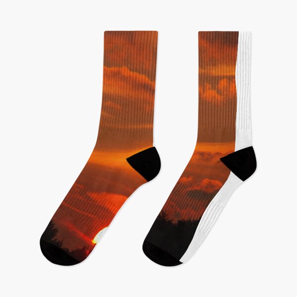 Item preview, Vibrant Red Sunset Sky Over Silhouetted Tree Line designed and sold by simonwarz.