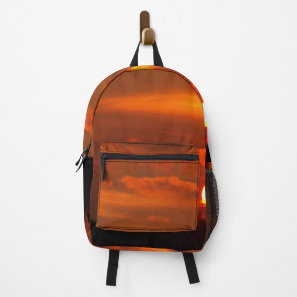 Item preview, Vibrant Red Sunset Sky Over Silhouetted Tree Line designed and sold by simonwarz.