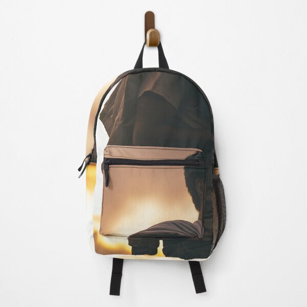 Item preview, Silhouette Portrait Of Young Man Holding Jacket At Sunset designed and sold by simonwarz.