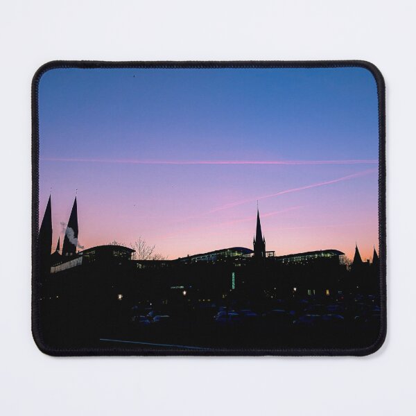 Item preview, Lübeck skyline at dusk – Holsten Gate & St. Mary's Church silhouette designed and sold by Tammigrafie.