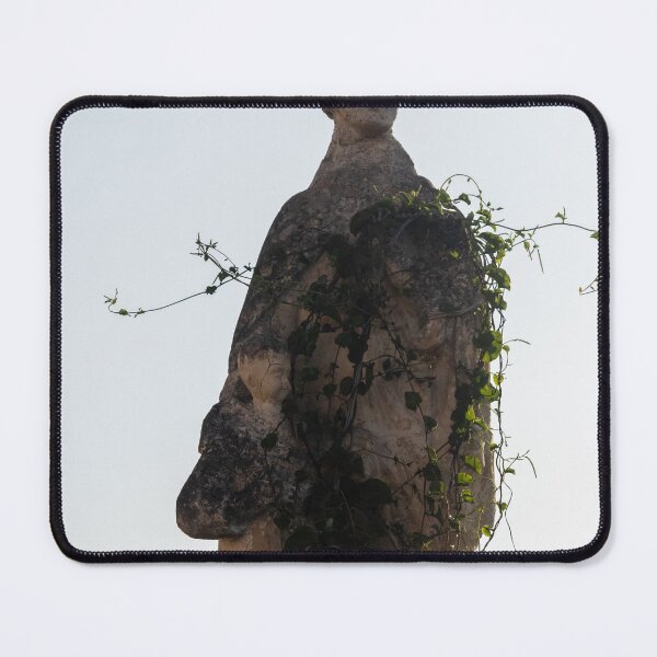 Item preview, Weathered Stone Statue Overgrown With Vines Against Bright Sky, Urban Ruin and Decay Scene designed and sold by Nmallia.