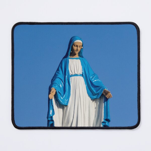 Item preview, Statue of the Virgin Mary in Blue Robe at Outdoor Shrine Against Clear Sky designed and sold by Nmallia.