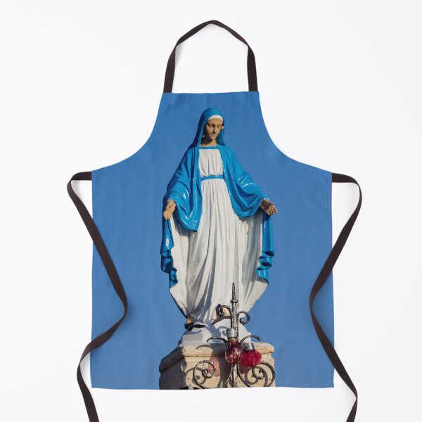Item preview, Statue of the Virgin Mary in Blue Robe at Outdoor Shrine Against Clear Sky designed and sold by Nmallia.