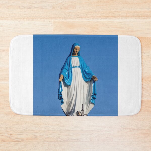 Item preview, Statue of the Virgin Mary in Blue Robe at Outdoor Shrine Against Clear Sky designed and sold by Nmallia.