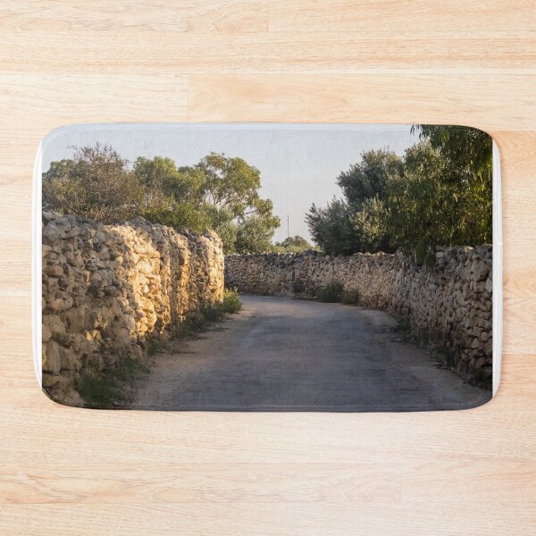 Item preview, Sunlit Country Lane With Traditional Dry Stone Walls and Olive Trees in Rural Landscape designed and sold by Nmallia.