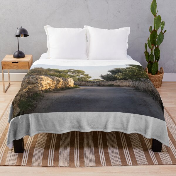 Item preview, Sunlit Country Lane With Traditional Dry Stone Walls and Olive Trees in Rural Landscape designed and sold by Nmallia.