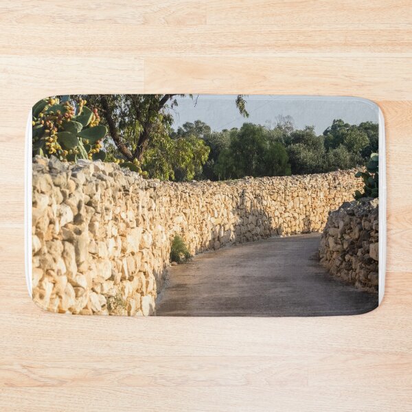 Item preview, Sunlit Country Lane With Traditional Dry Stone Walls and Olive Trees in Rural Landscape designed and sold by Nmallia.