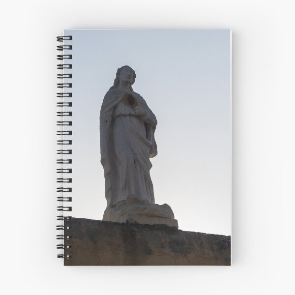 Item preview, Silhouette of Sacred Heart Jesus Statue on Rooftop at Dusk Against Clear Sky designed and sold by Nmallia.