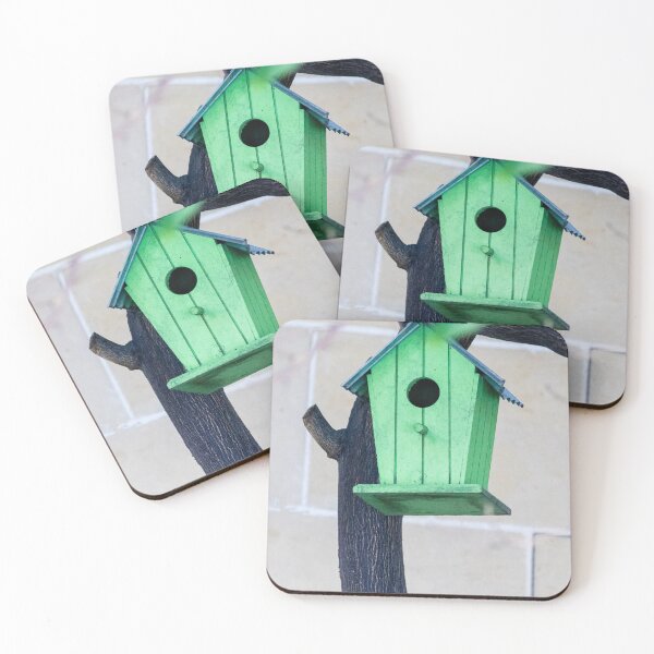 Item preview, Green Wooden Birdhouse Mounted On Tree Trunk In Backyard Garden Close-Up designed and sold by Nmallia.