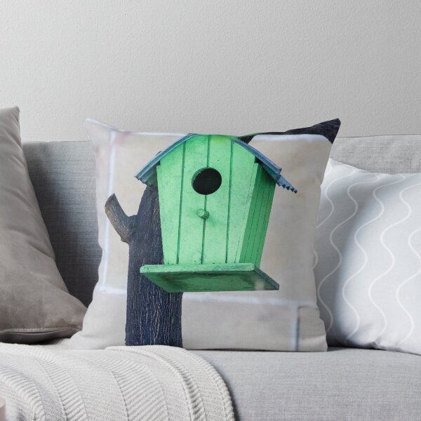 Item preview, Green Wooden Birdhouse Mounted On Tree Trunk In Backyard Garden Close-Up designed and sold by Nmallia.