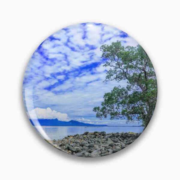 Item preview, Lone Mangrove Tree On Rocky Beach Coast designed and sold by Luxxe87.