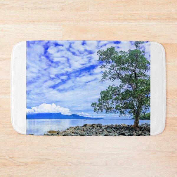 Item preview, Lone Mangrove Tree On Rocky Beach Coast designed and sold by Luxxe87.