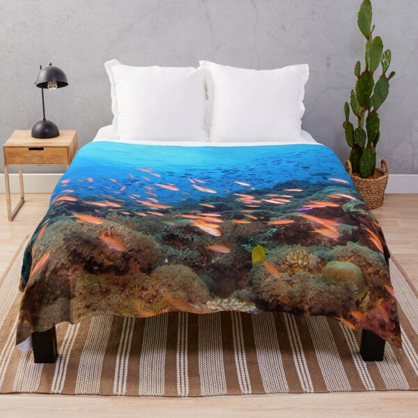 Item preview, Vibrant Coral Reef with Swimming Orange Fish Underwater designed and sold by PetalsPaws.