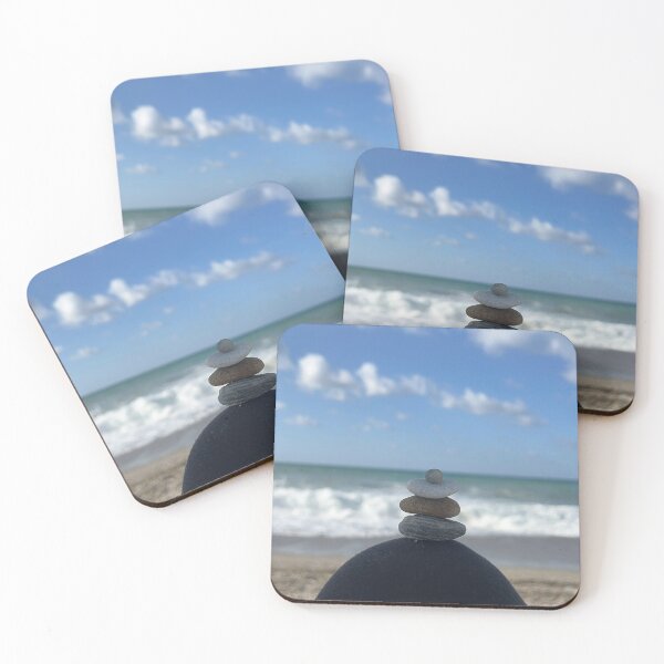 Item preview, Stacked pebbles with the ocean in the background  designed and sold by FindMebyTalia.