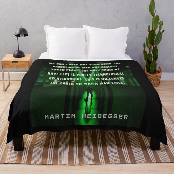 Item preview, Martin Heidegger quote: We don't need any atom bomb. The uprooting of man has already taken place. The only thing we have left is purely technological relationships. designed and sold by artbleed.