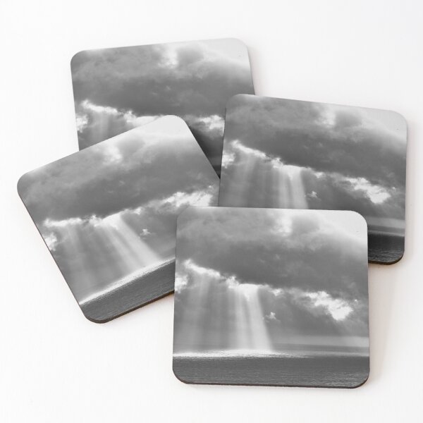 Item preview, Ray of light breaking through the clouds over the sea black and white photographic art print wall decor designed and sold by Astrid Arkhangelsky.