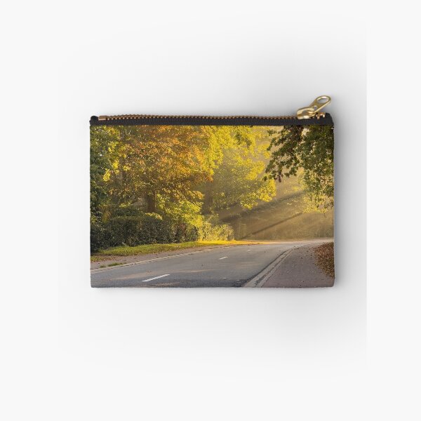 Item preview, Golden Autumn Sunlight on a Peaceful Forest Road designed and sold by Between Clouds.