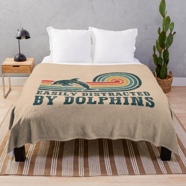 Item preview, Easily Distracted By Dolphins Vintage Retro Sunset Ocean Sea Life designed and sold by Dmetalx Art Apparel.