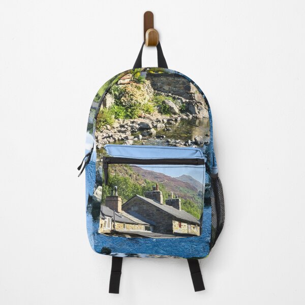Item preview, Beddgelert village in Snowdonia, Wales, with traditional stone cottages beside a rocky river and dramatic mountain scenery. designed and sold by Kevin Hellon.