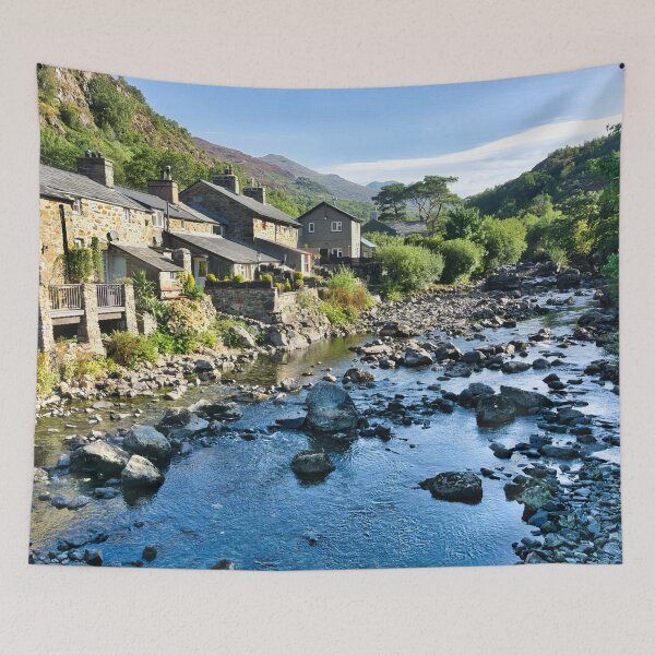 Item preview, Beddgelert village in Snowdonia, Wales, with traditional stone cottages beside a rocky river and dramatic mountain scenery. designed and sold by Kevin Hellon.
