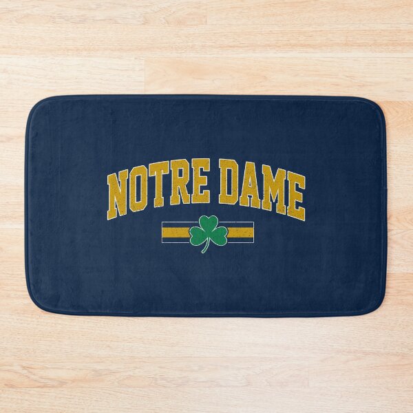 Item preview, Vintage Notre Dame Classic Distressed Shamrock Three Stripes Football designed and sold by Floral Vintage.