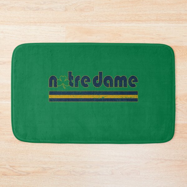Item preview, Vintage Notre Dame Three Stripes Shamrock Football designed and sold by Floral Vintage.